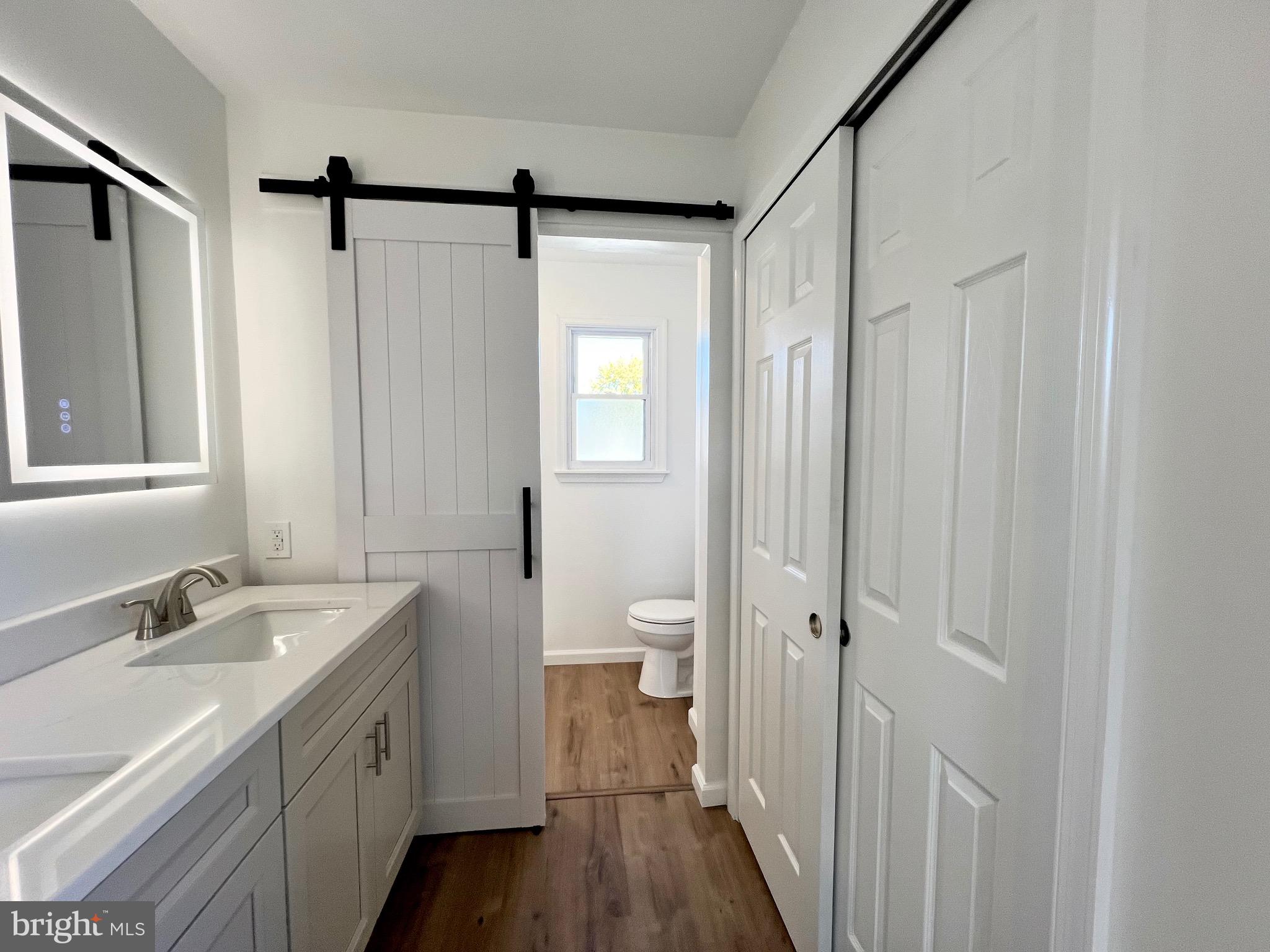 934 North Beecham Road Williamstown, NJ 08094 - Photo 13 of 26 a bathroom with a sink a toilet and shower