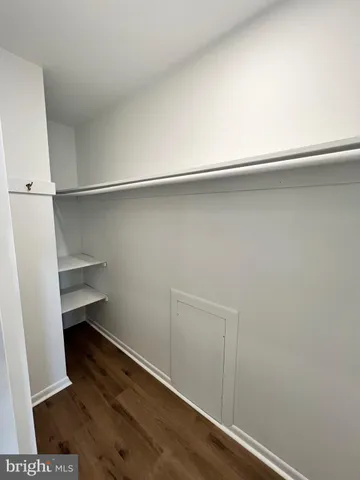 a hallway with a wooden floor