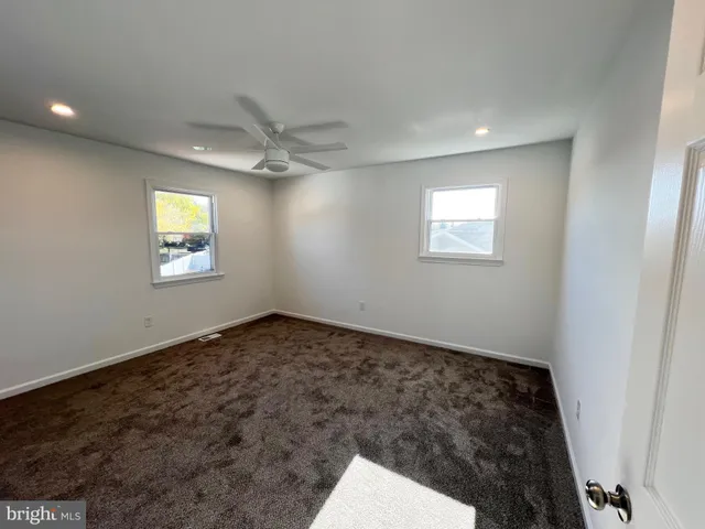 a view of a window in an empty room