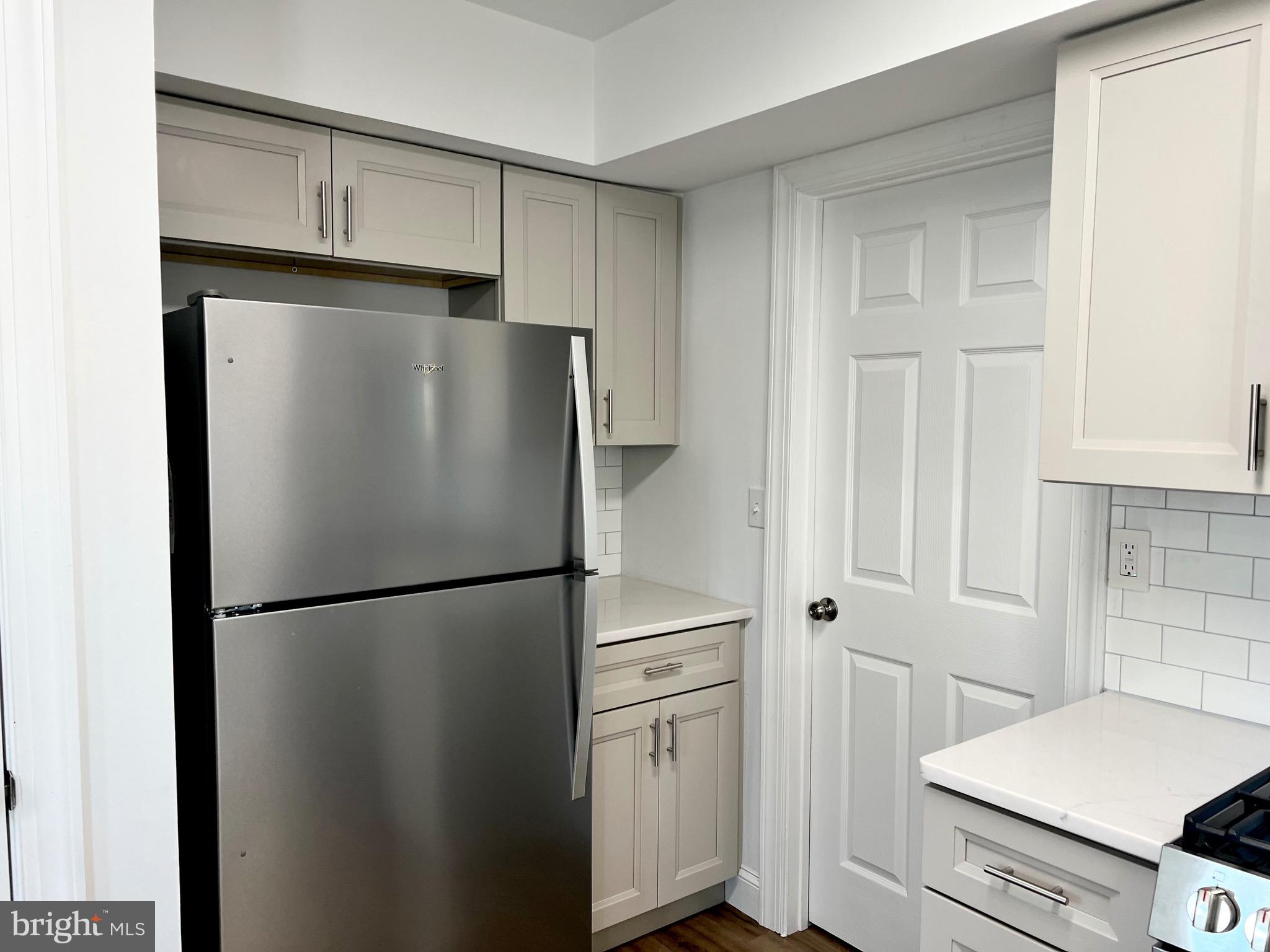 934 North Beecham Road Williamstown, NJ 08094 - Photo 8 of 26 a white refrigerator freezer and a stove sitting inside of a kitchen