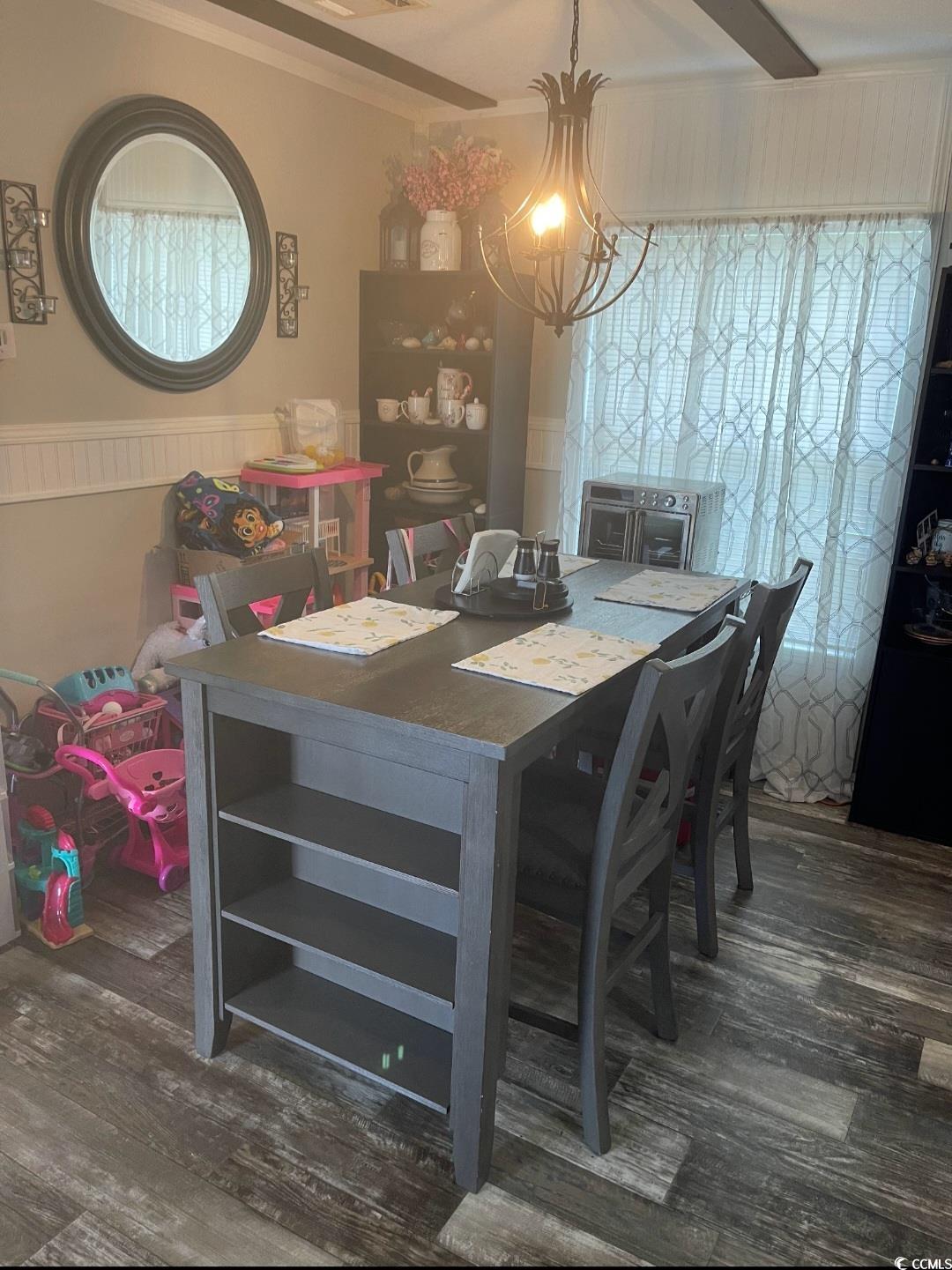 2470 Wigley Road Loris, SC 29569 - Photo 13 of 30 Dining room featuring beamed ceiling and dark wood-style floors