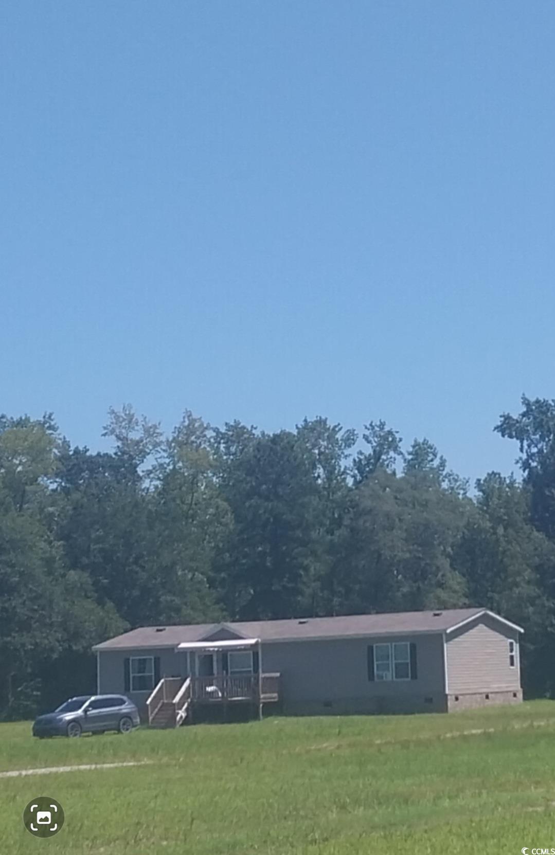 2470 Wigley Road Loris, SC 29569 - Photo 2 of 30 Ranch-style house featuring crawl space and a front lawn