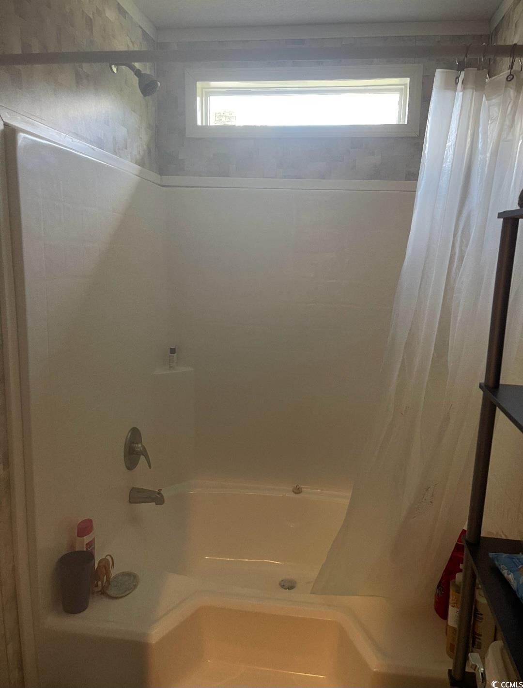 2470 Wigley Road Loris, SC 29569 - Photo 24 of 30 Full bathroom with shower / bath combo with shower curtain