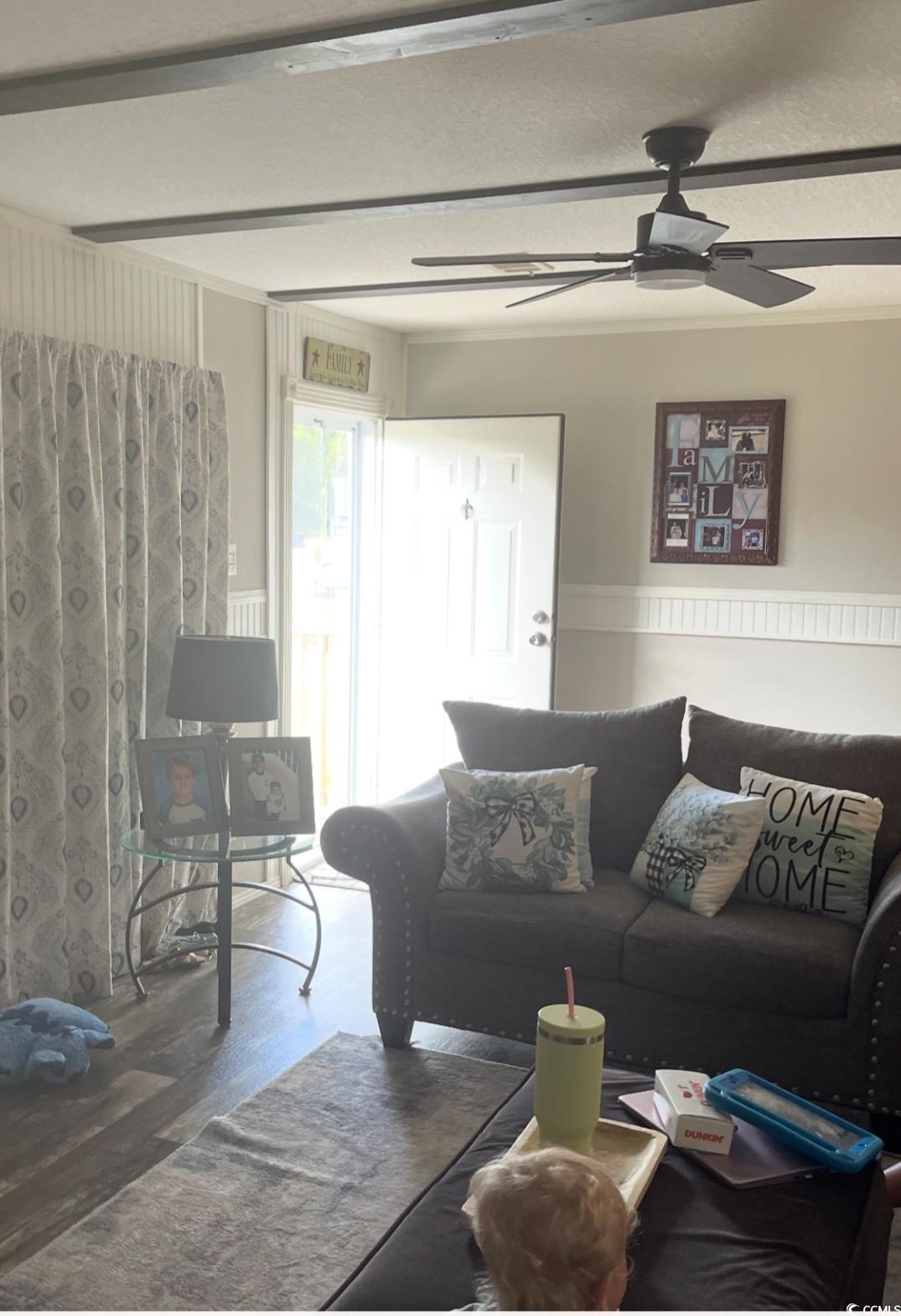 2470 Wigley Road Loris, SC 29569 - Photo 10 of 30 Living room featuring wood finished floors and ceiling fan