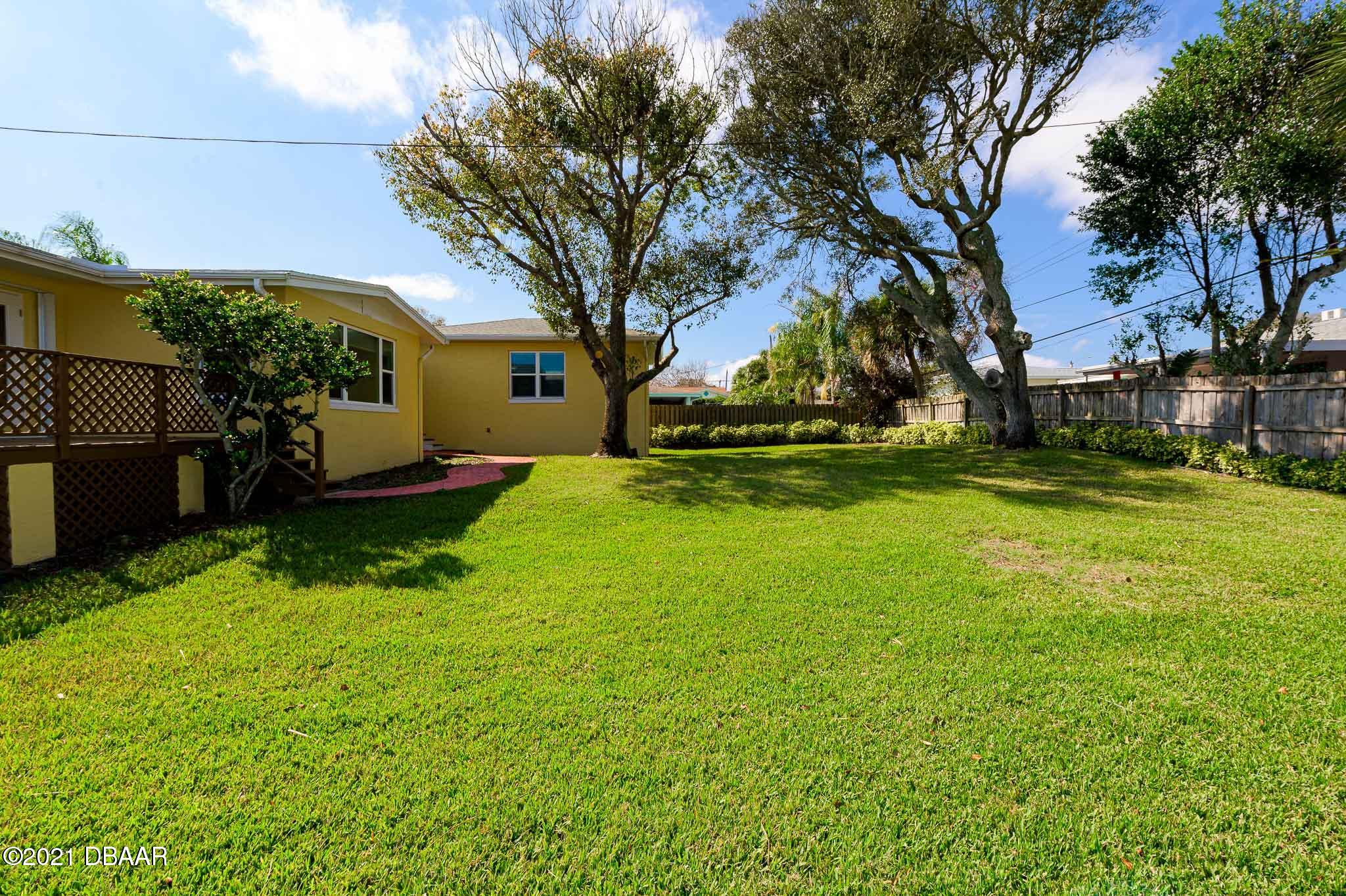 103 University Circle Ormond Beach, FL 32176 - Photo 45 of 55 Sprawling fenced yard!