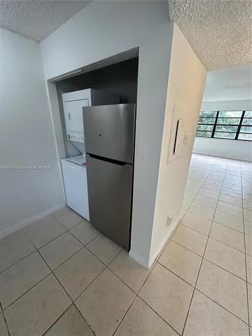 a view of a storage & utility room with washer and dryer