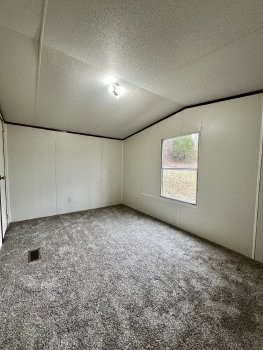 3845 Wickham Road Palmyra, TN 37142 - Photo 11 of 12 an empty room with windows