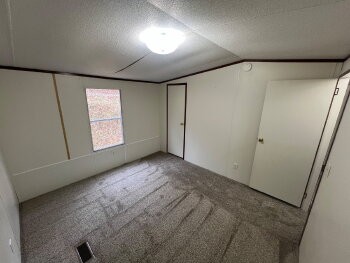 3845 Wickham Road Palmyra, TN 37142 - Photo 10 of 12 an empty room with windows