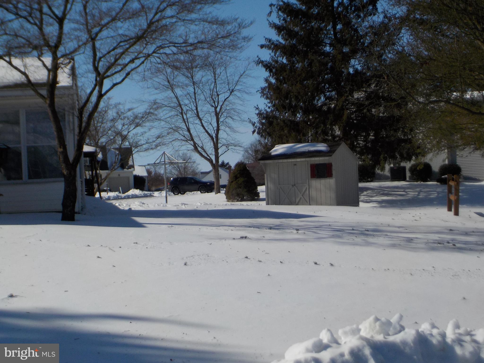 4 Justin Court Lititz, PA 17543 - Photo 3 of 14 a view of a house with a snow on the road