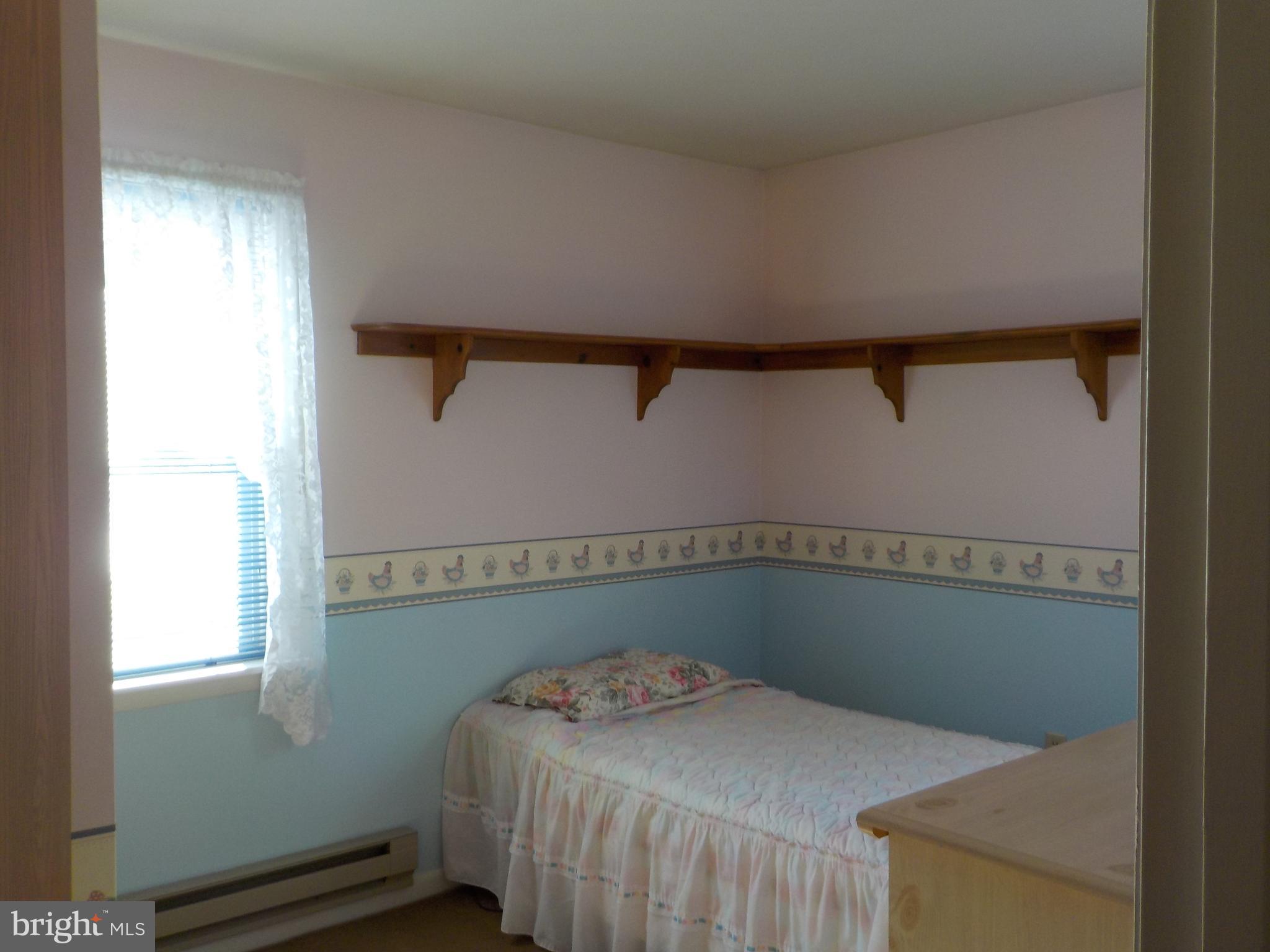 4 Justin Court Lititz, PA 17543 - Photo 8 of 14 a bedroom with a bed and a window
