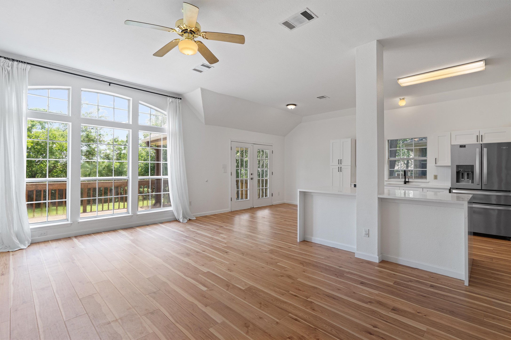 100 Parque Circle Georgetown, TX 78626 - Photo 11 of 39 a view of empty room with wooden floor and fan