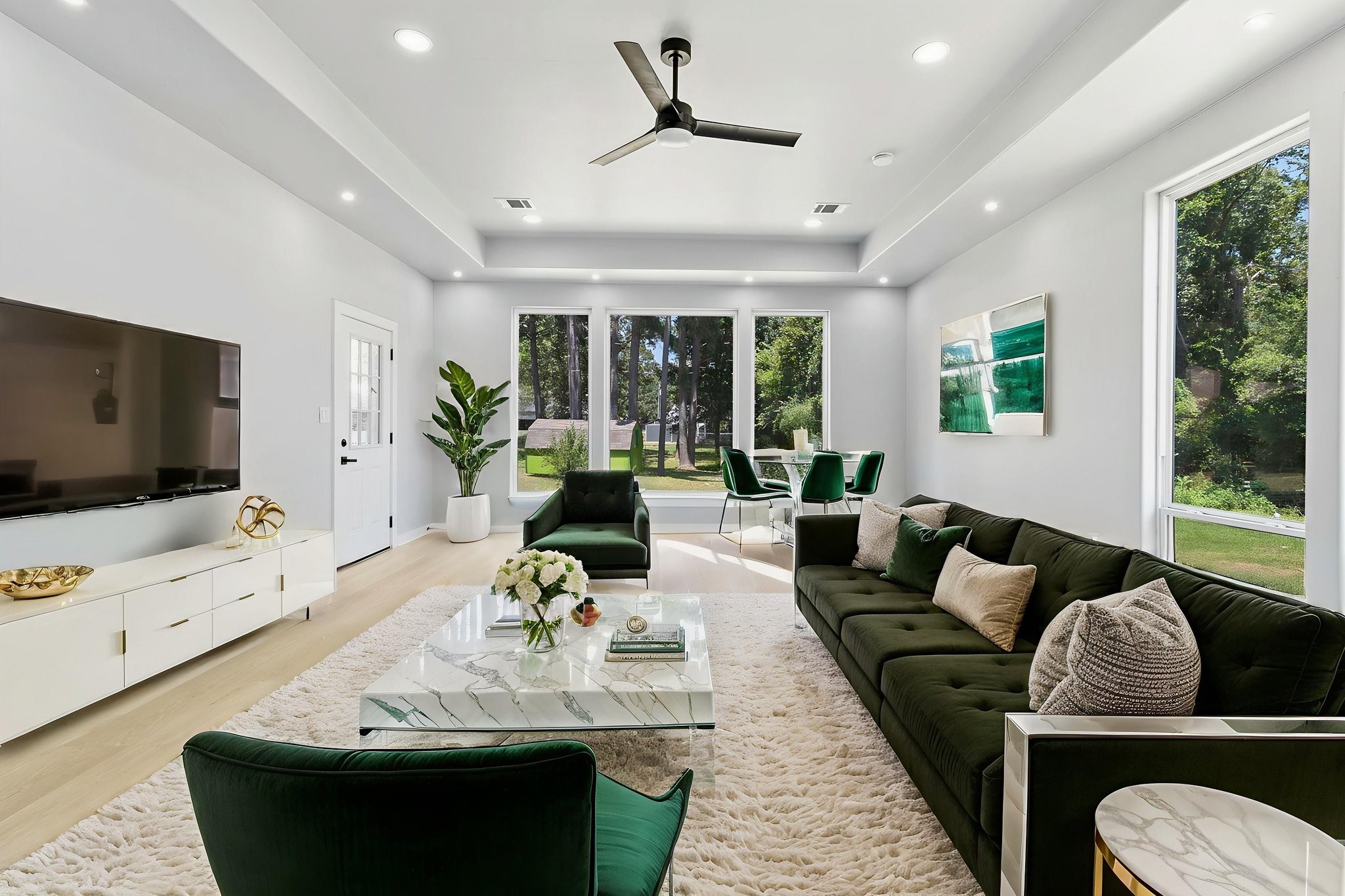 599 Bridgeview Drive Onalaska, TX 77360 - Photo 15 of 27 a living room with furniture fireplace and a flat screen tv