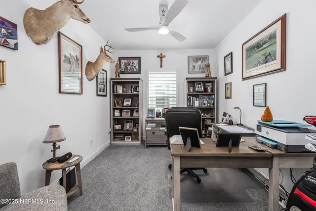 a kitchen with kitchen island granite countertop a center island a sink stainless steel appliances and cabinets