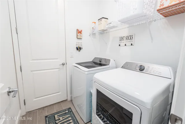 a view of a house with backyard porch and garden