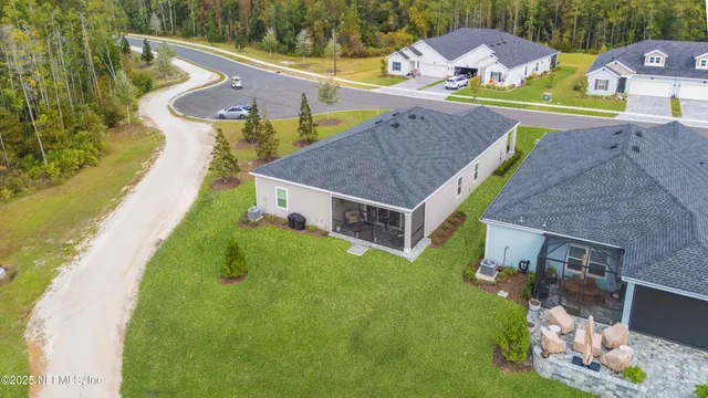 a aerial view of a house with garden
