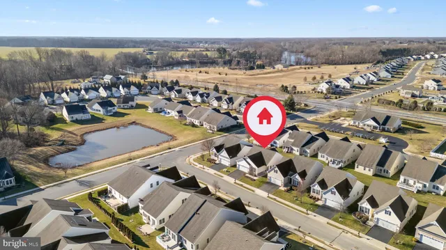 an aerial view of a table and chairs
