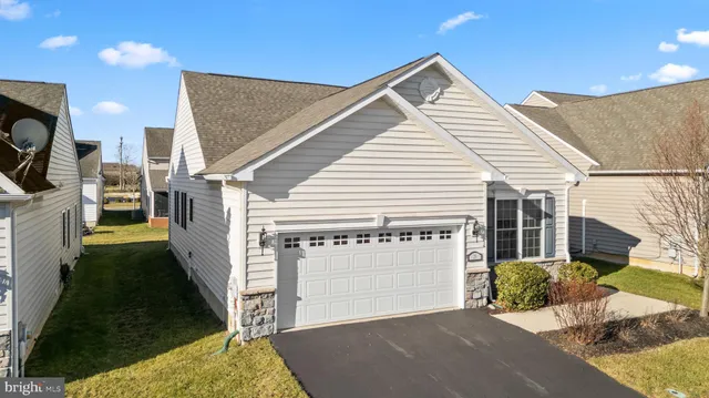 a view of a house with a garage