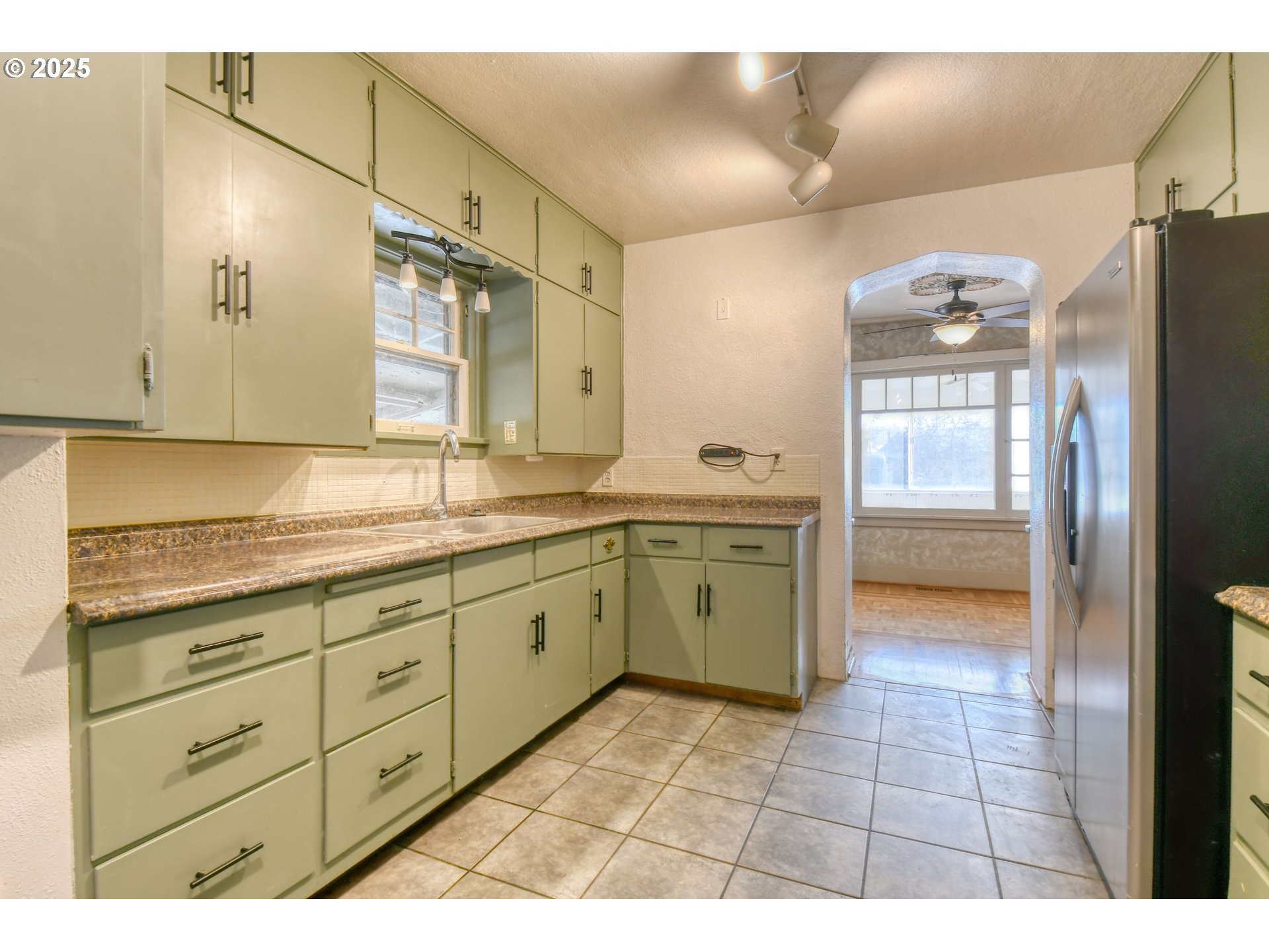 261 Southwest 2nd Street Pilot Rock, OR 97868 - Photo 12 of 45 a bathroom with a granite countertop sink a mirror and a