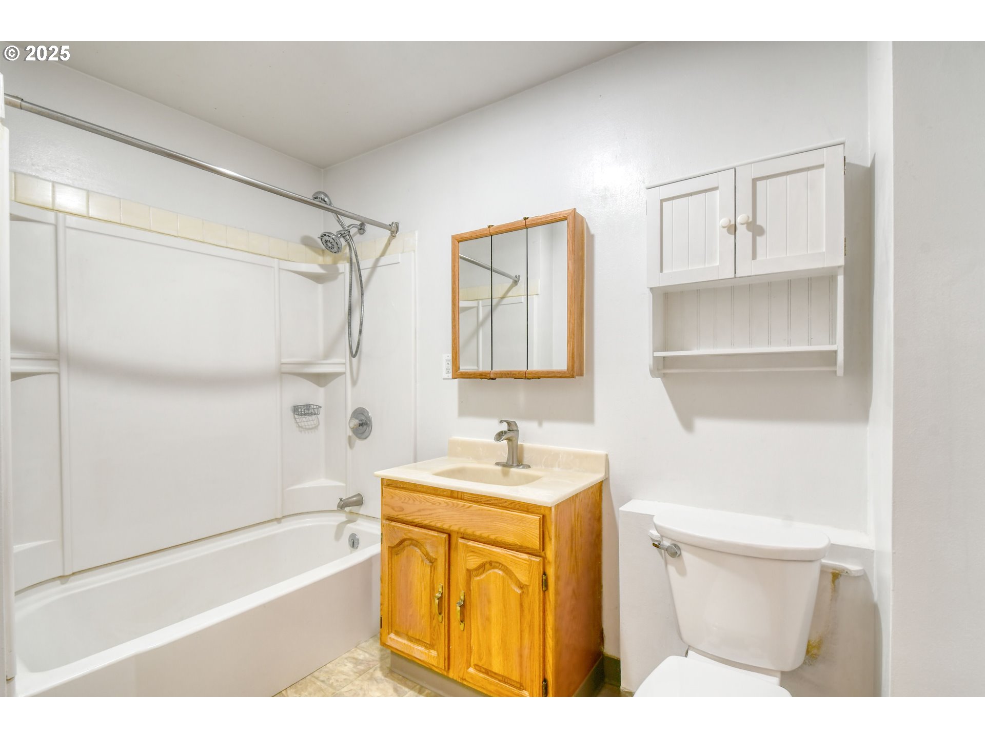 261 Southwest 2nd Street Pilot Rock, OR 97868 - Photo 21 of 45 a bathroom with a sink a toilet and shower