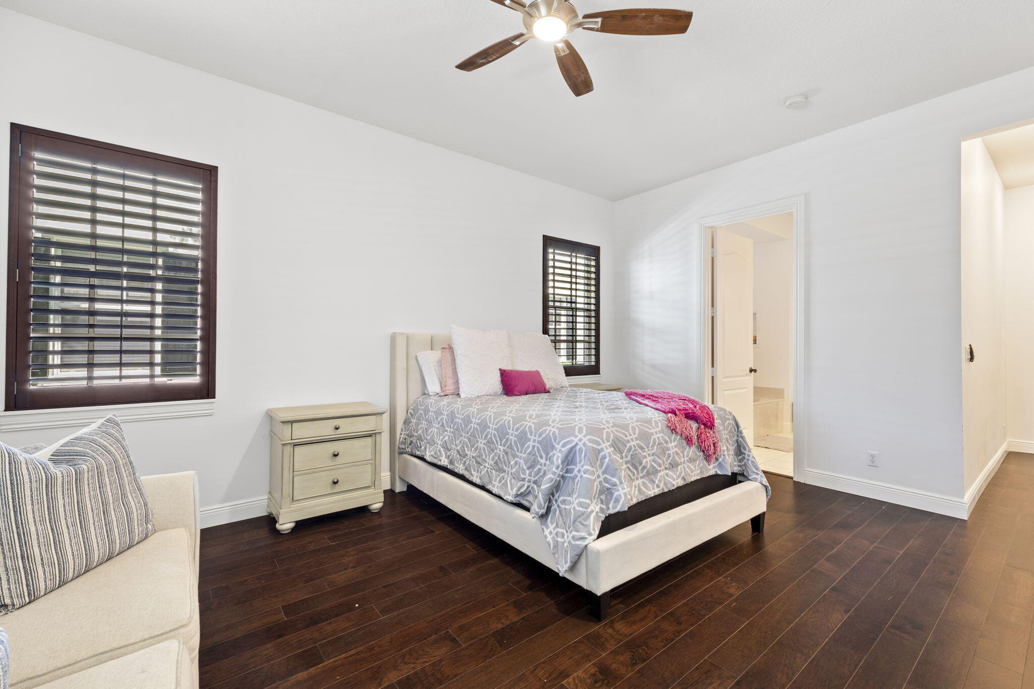 202 Botanica Drive Jupiter, FL 33458 - Photo 23 of 33 a bedroom with a bed and window