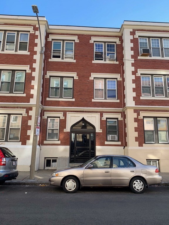 16 Royce Road, Unit 5 Boston, MA 02134 - Photo 9 of 10 a car parked in front of a building