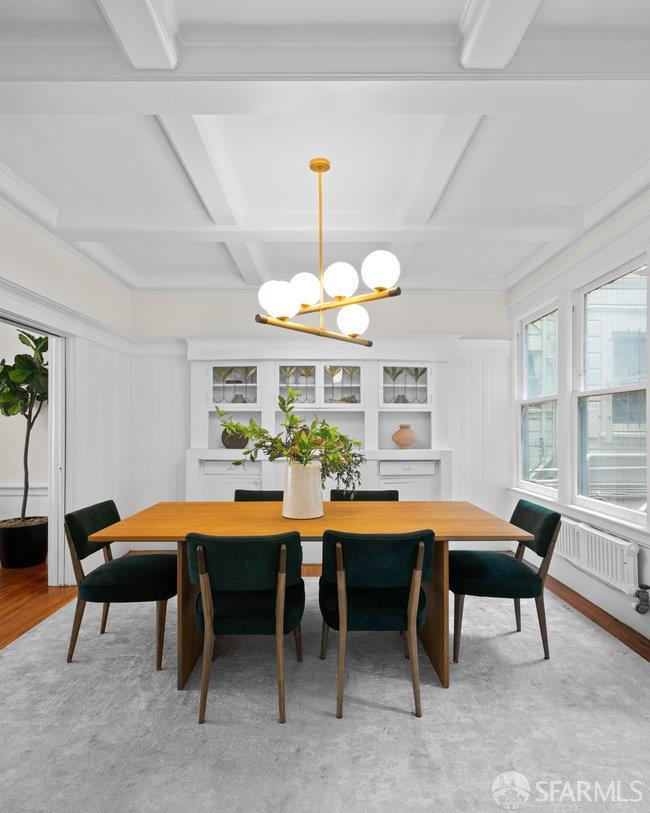 1108-1112 Pine Street San Francisco, CA 94109 - Photo 13 of 53 a dining room with a table and chairs