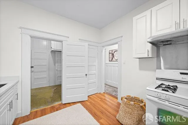 a bedroom with a bed and a cabinets