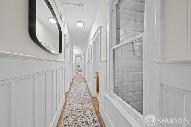 1108-1112 Pine Street San Francisco, CA 94109 - Photo 27 of 53 a bathroom with a sink a mirror and a shower