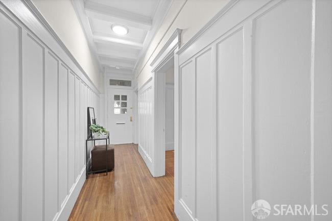 1108-1112 Pine Street San Francisco, CA 94109 - Photo 45 of 53 a view of a hallway with wooden floor and staircase