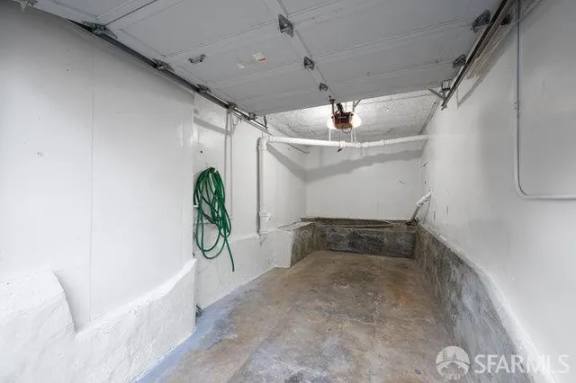 a picture of a bathroom with mirror and shower