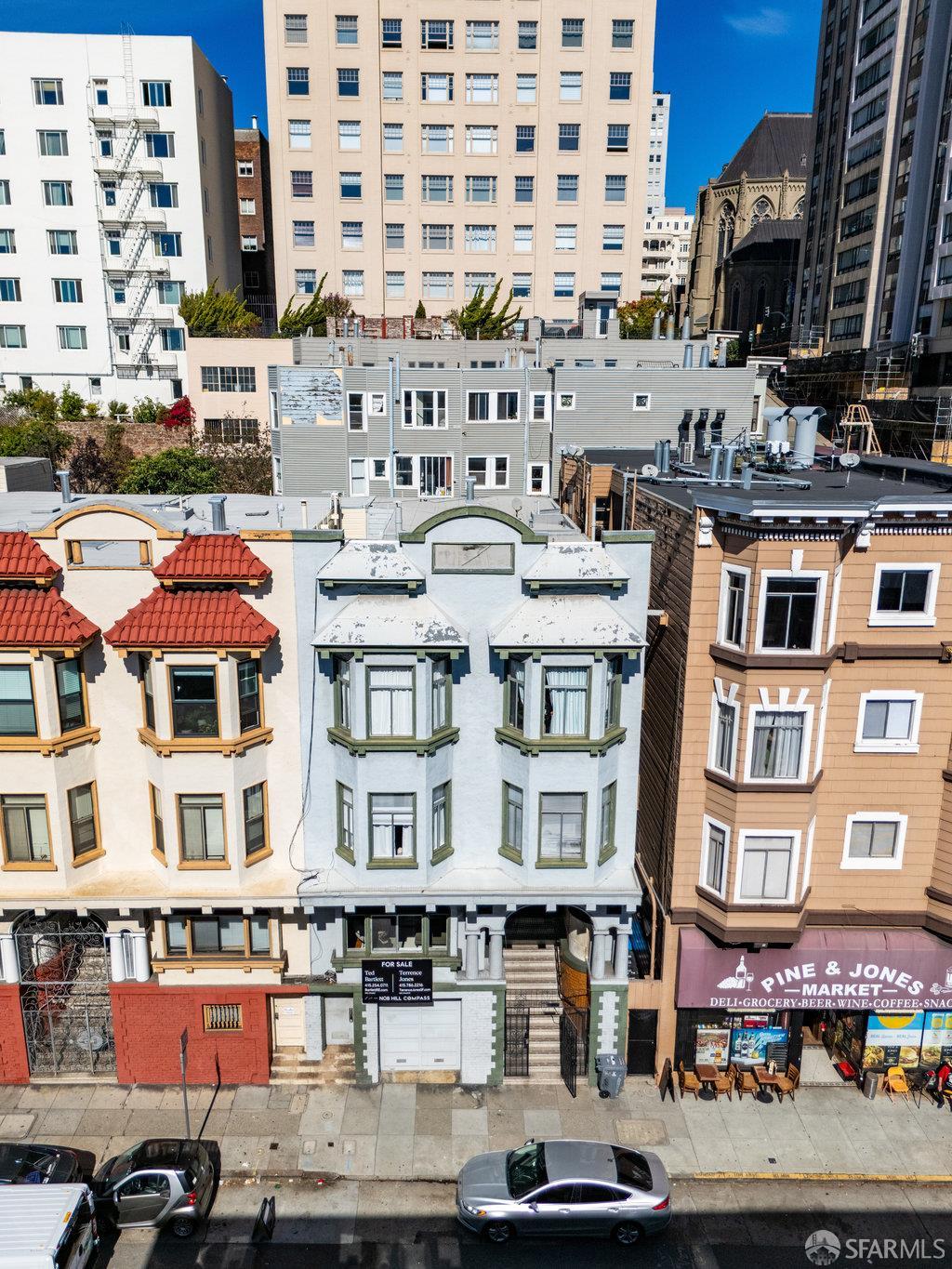 1108-1112 Pine Street San Francisco, CA 94109 - Photo 52 of 53 a picture of street with building and cars parked