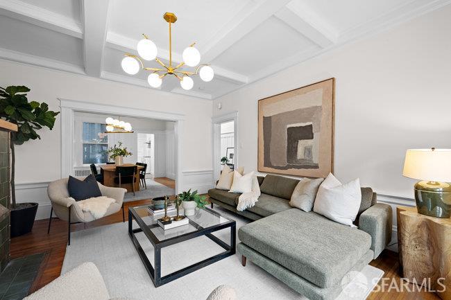 1108-1112 Pine Street San Francisco, CA 94109 - Photo 9 of 53 a living room with furniture chandelier and a chandelier