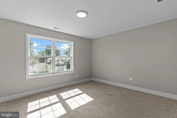 an empty room with an entryway