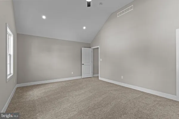 a view of a room with racks on the wall