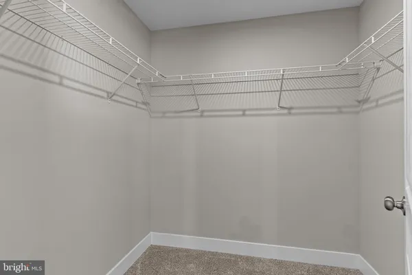 a bathroom with 2 sink toilet and a mirror