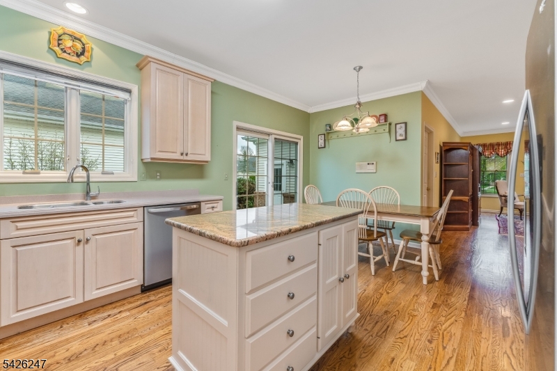 43 Falcon Way Washington, NJ 07882 - Photo 11 of 29 a kitchen with a sink cabinets and wooden floor