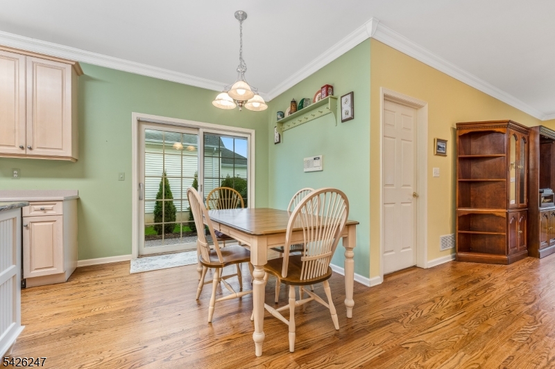 43 Falcon Way Washington, NJ 07882 - Photo 14 of 29 a view of a dining room with furniture window and wooden floor