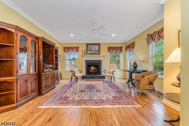 43 Falcon Way Washington, NJ 07882 - Photo 17 of 29 a living room with furniture fireplace and wooden floor