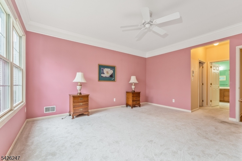 43 Falcon Way Washington, NJ 07882 - Photo 20 of 29 an empty room with a window and a kitchen