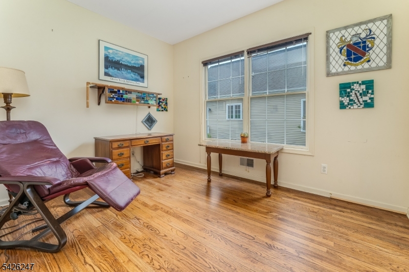 43 Falcon Way Washington, NJ 07882 - Photo 23 of 29 a living room with furniture and a wooden floor