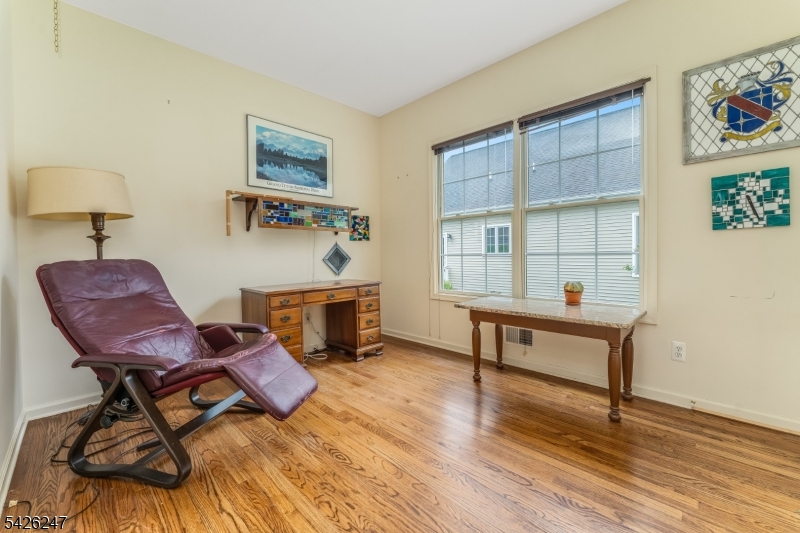 43 Falcon Way Washington, NJ 07882 - Photo 25 of 29 a living room with furniture and a wooden floor