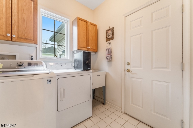43 Falcon Way Washington, NJ 07882 - Photo 27 of 29 a bathroom with a sink and a mirror