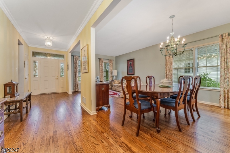 43 Falcon Way Washington, NJ 07882 - Photo 3 of 29 a view of a dining room with furniture and wooden floor