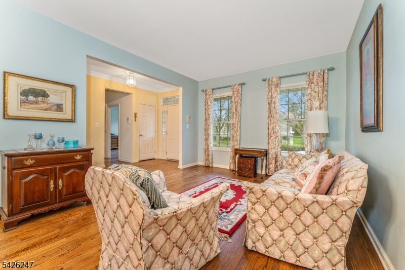 43 Falcon Way Washington, NJ 07882 - Photo 7 of 29 a living room with furniture fireplace and a large window