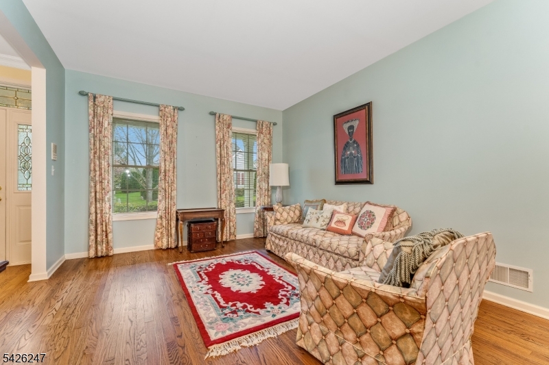 43 Falcon Way Washington, NJ 07882 - Photo 8 of 29 a living room with furniture and a fireplace