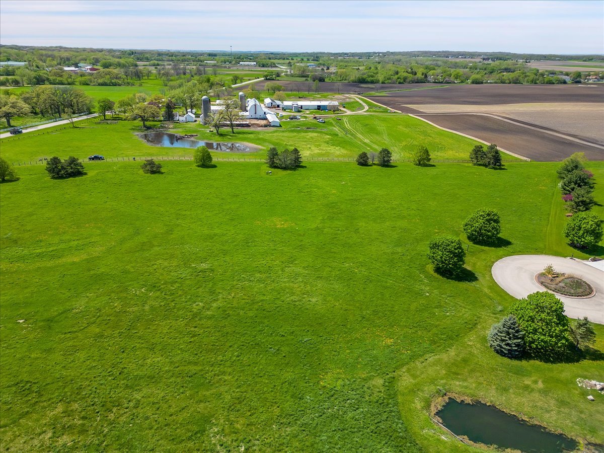 17405 Wildflower Circle Union, IL 60180 - Photo 12 of 18 a view of a lush green field