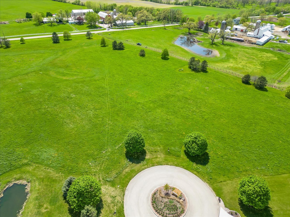 17405 Wildflower Circle Union, IL 60180 - Photo 16 of 18 a view of a golf course with a lake
