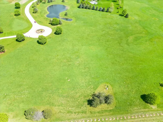 a bathroom with a sink mirror and vanity