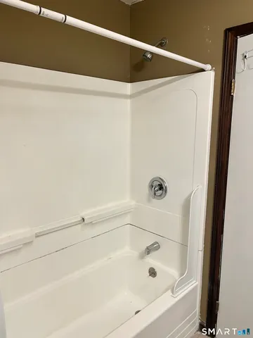 a bathroom with a bathtub