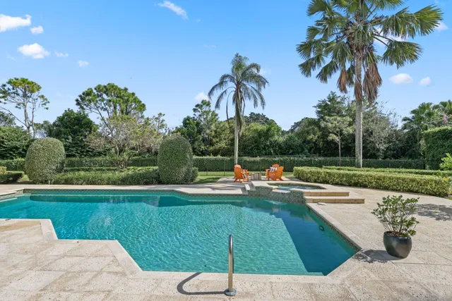 a view of a house with swimming pool